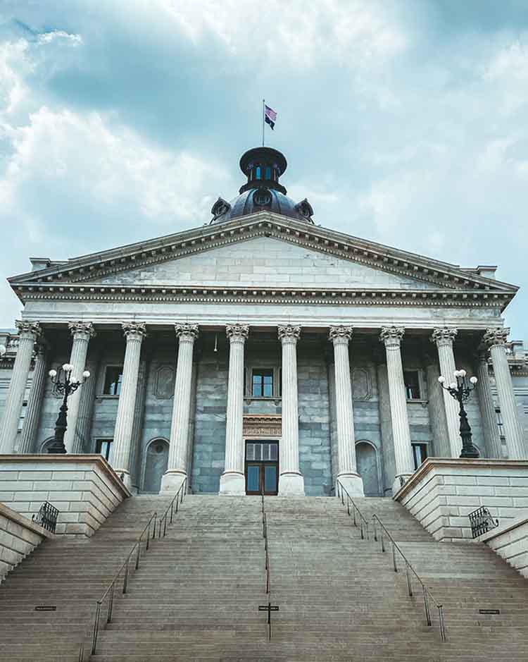 An income tax form and a cup of coffee on a desk